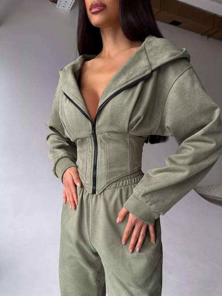 Dame moderat jumpsuit med tætsiddende design og innovativ lynlås Stilla