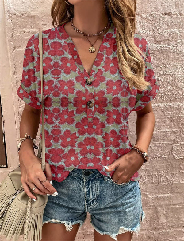 Damebluse med blomsterdesign og knaplukning Stilla