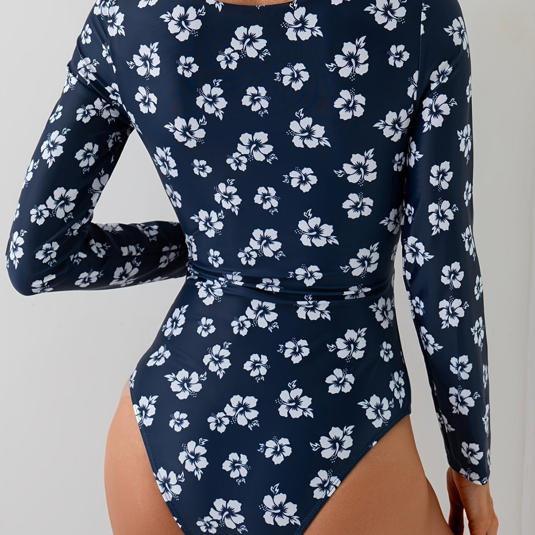 Dame én deler badedragt med floralt cut-out og dekorativ twist Stilla