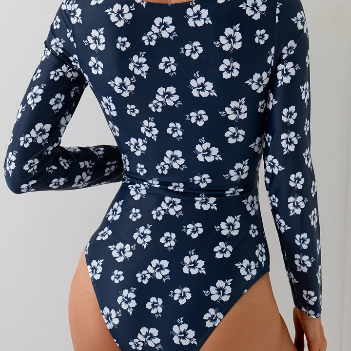 Dame én deler badedragt med floralt cut-out og dekorativ twist Stilla