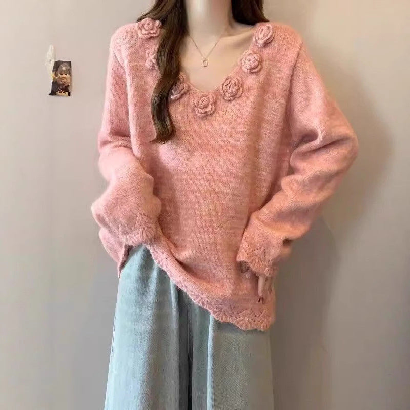 Kvinders store strikket sweater med blomsterapplikationer Stilla