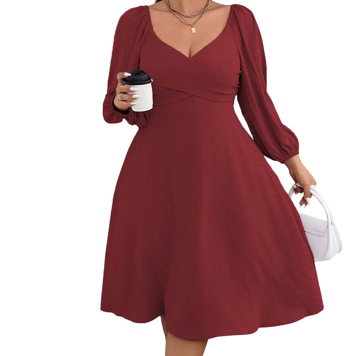 Dame Midi-kjole med elegant indviklingslook og puffærmer Stilla