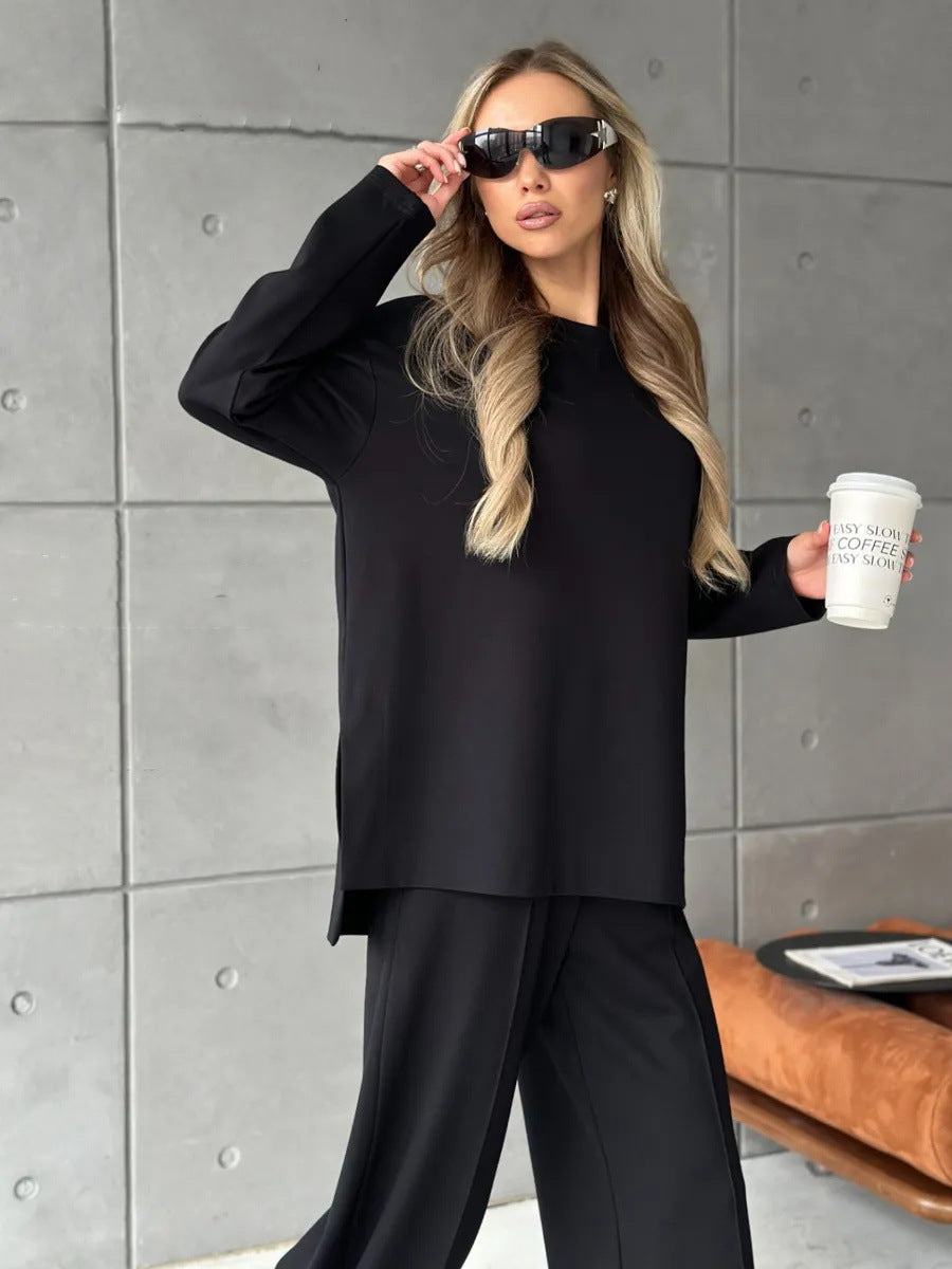 Damer elegant sweatsuit med løs pasform og stilfuld mærkedetalje Skovae