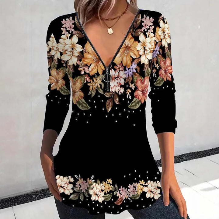 Damebluse med blomsterprint og lynlås Stilla