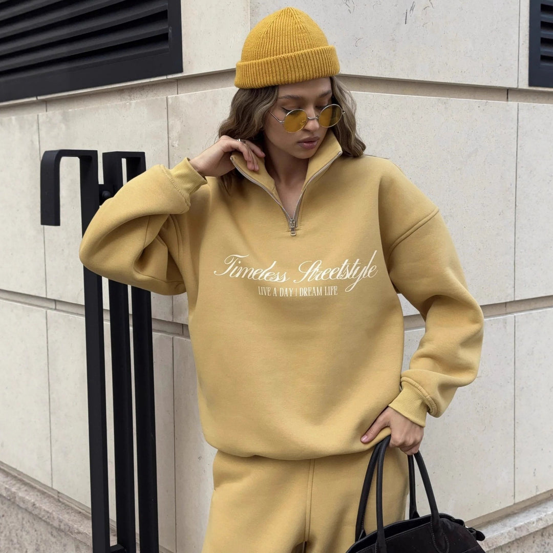 Kvindernes sporty halvlange pullover med fuldlængde lynlås og oversized pasform