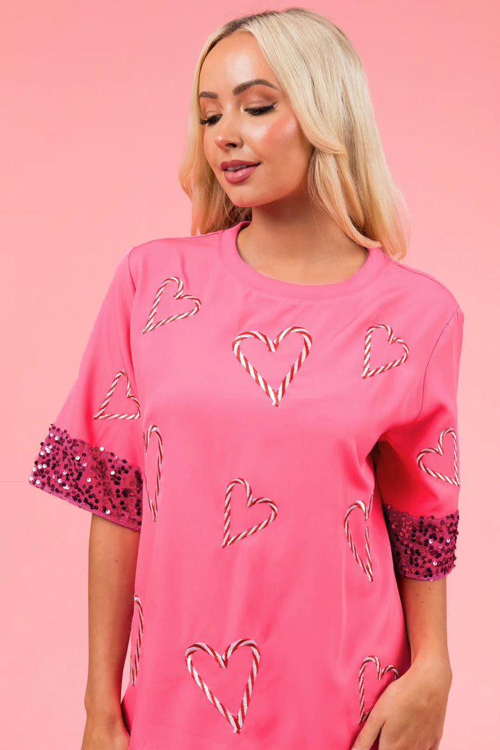 Dame mode T-shirt med glitrende pailletærmer og hjertemotiv Stiila