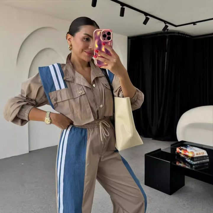Dame sporty jumpsuit med sofistikeret snoreliv og kontraststriber Stilla