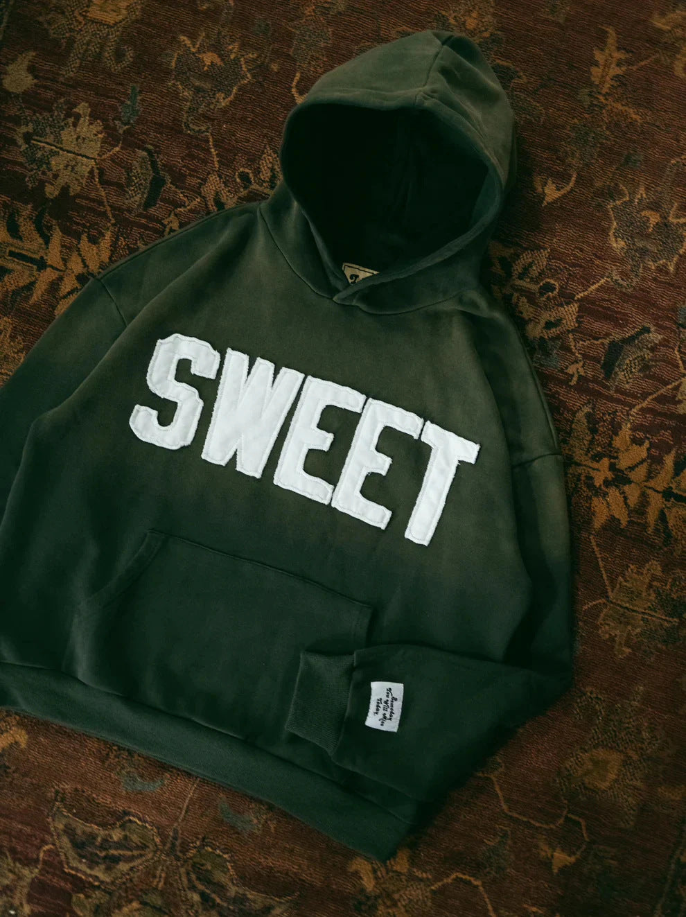 Unisex nan weit gesnit hoodies med påsyede bogstaver og kængurulomme Skovae