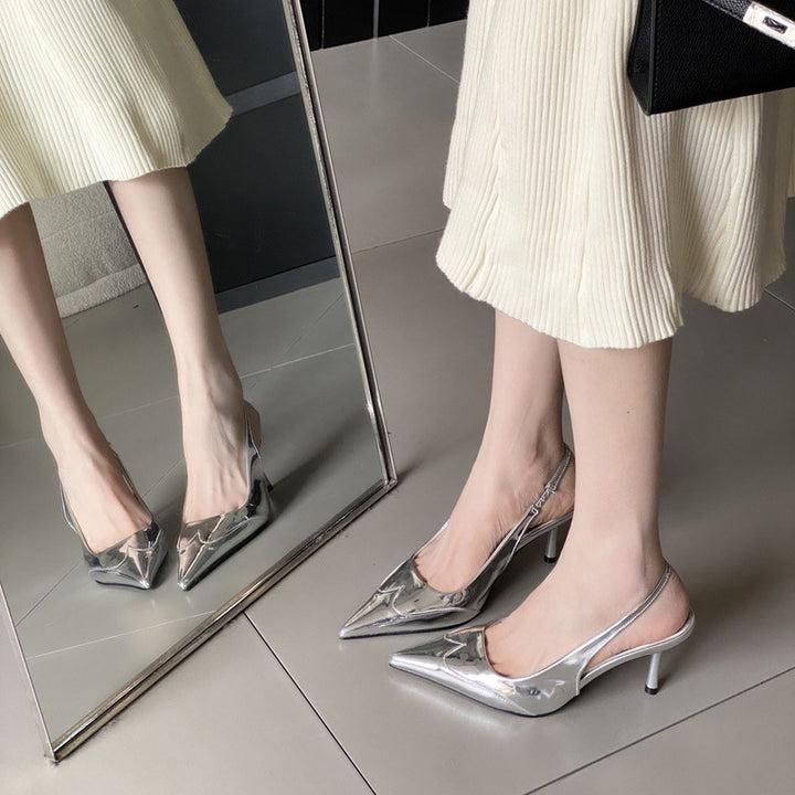 Dame Slingback Pumper med elegant metallic spids og buet design Stilla