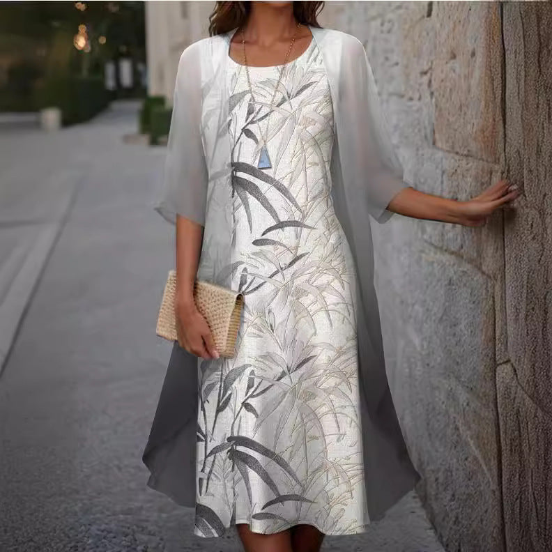 Dame elegant maxikjole med gennemsigtig chiffonoverdel og blomsterprint Stilla