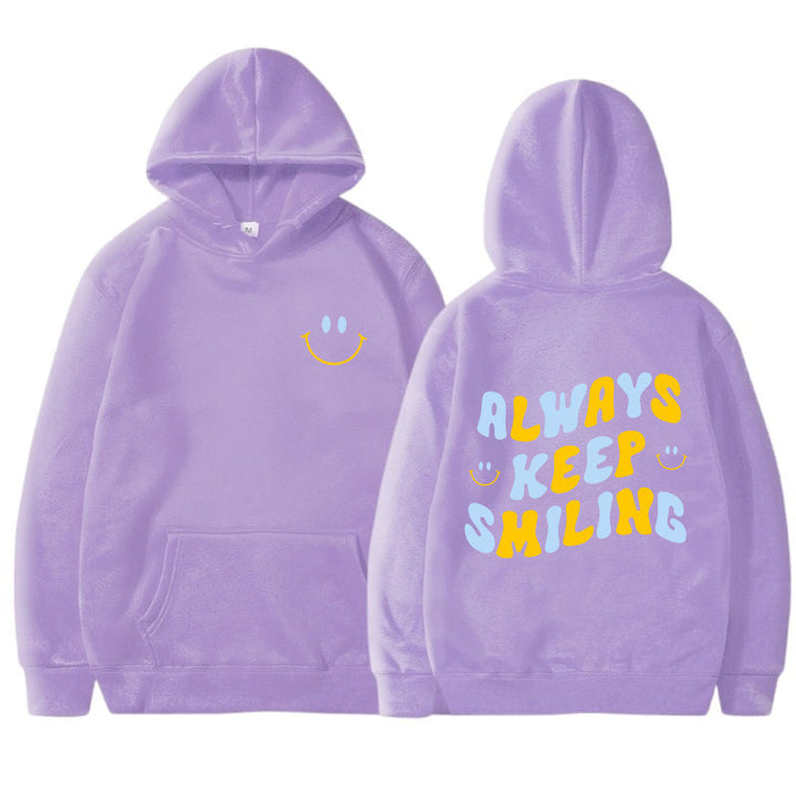 Dame hoodie med munter skrift og praktiske kangaroo lommer Skovae