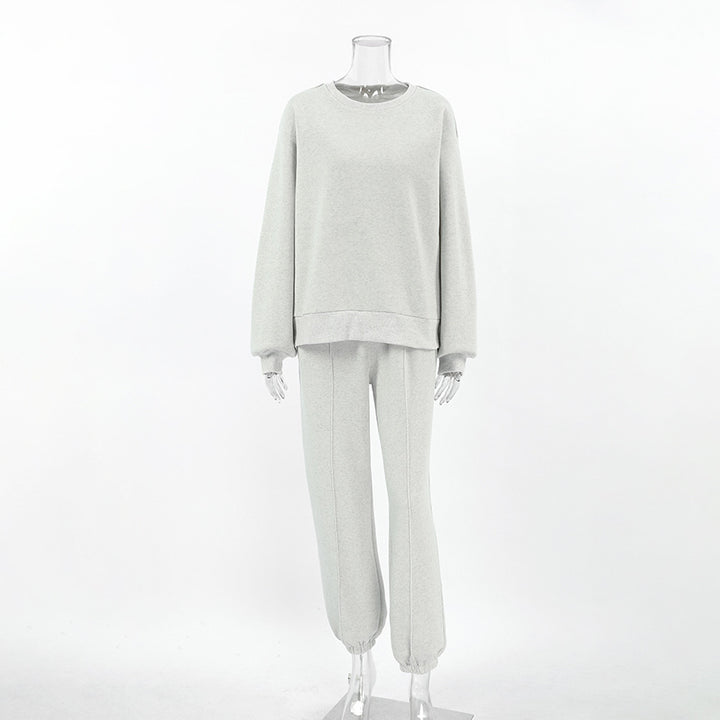 Dame fritidsdragt med sporty design og løs pasform Stilla