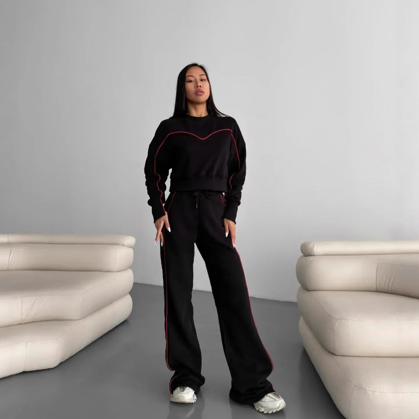 Dame sporty lounge sæt med en løs pasform og sidelister