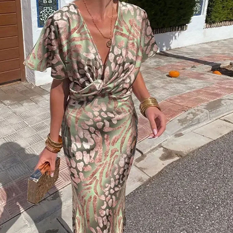 Dame Maxikjole med elegant V-hals og unikt mønster Stilla