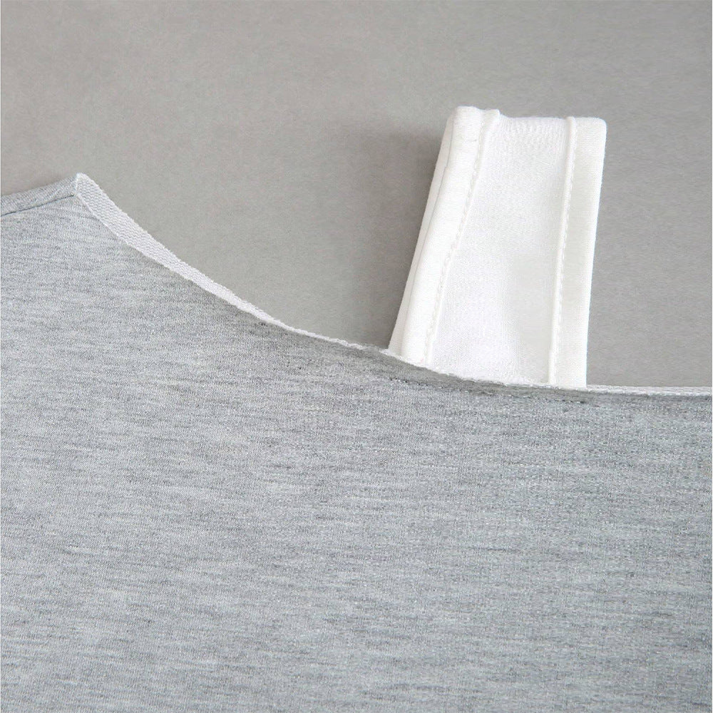 Kvinders cropped sweatshirt med asymmetrisk design og voluminøse ærmer Stilla