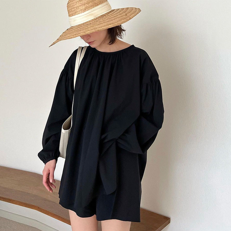 Damebluse med voluminøse ærmer og elegant snit Stilla