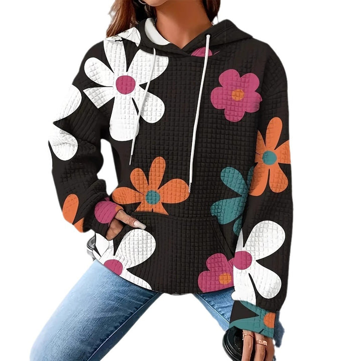 Dame hættebluse med blomsterdesign og struktureret stof Stilla