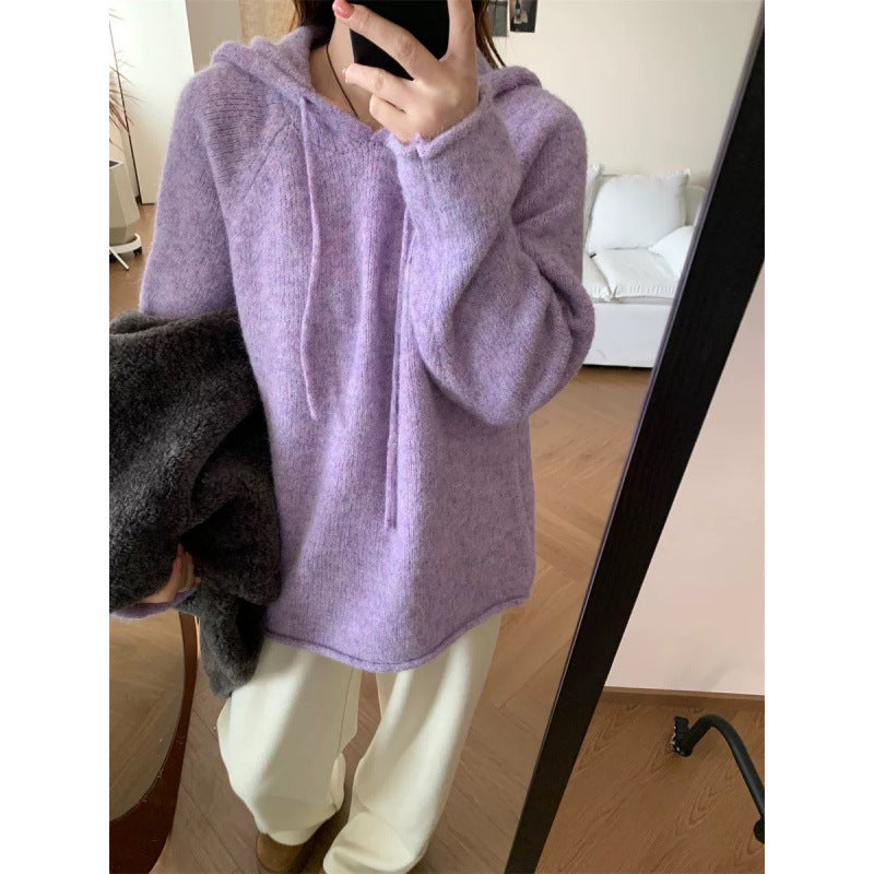 Kvinders hyggelige hætte sweatshirt lavet af blødt fleece-materiale med kengurulomme Stilla
