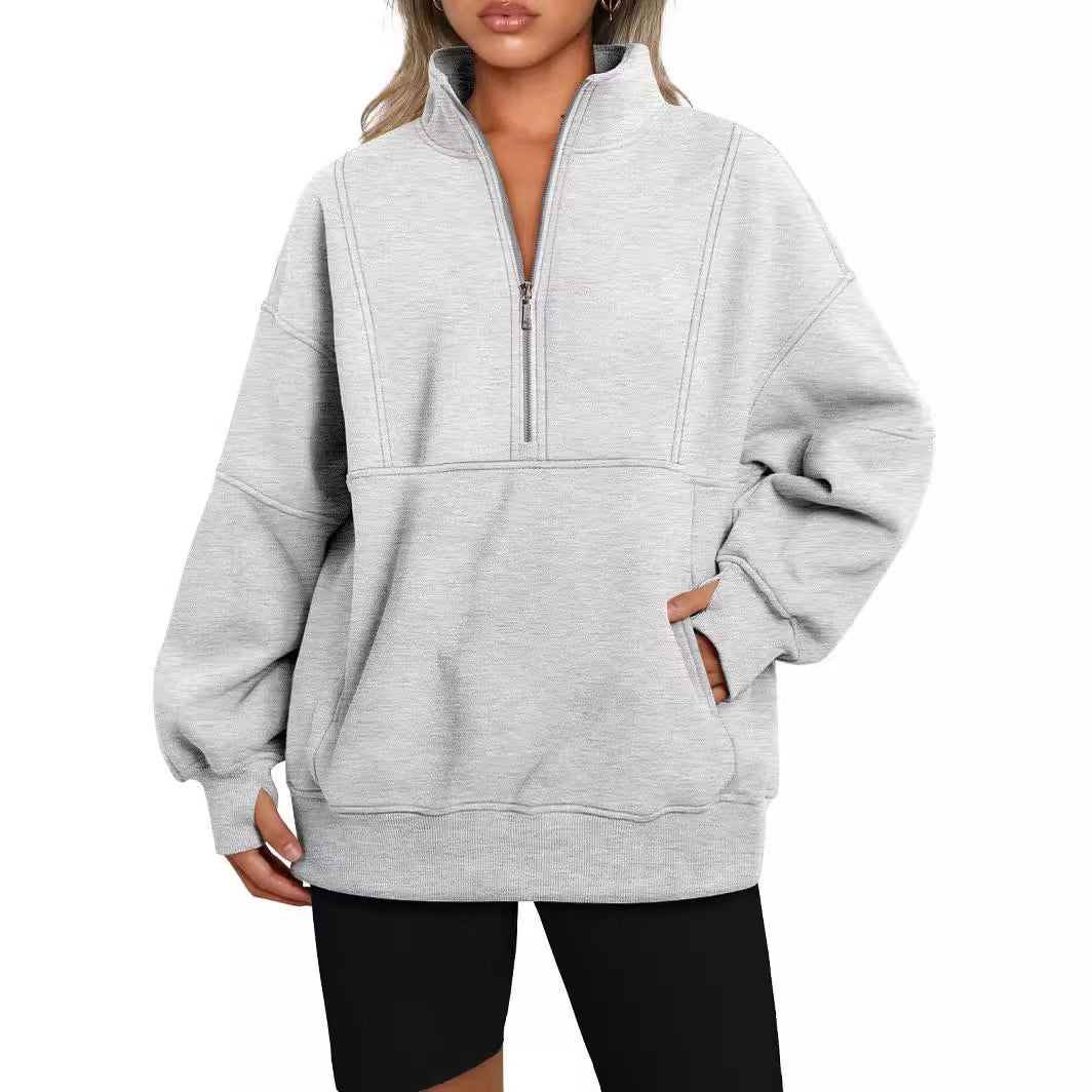 Dame Sporty Hoodie med halvdelen lynlås og voluminøse ærmer Stilla