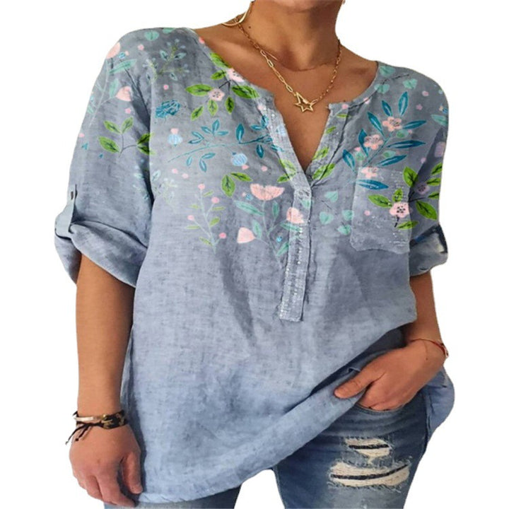 Damebluse med floral broderedesign og V-hals Stilla