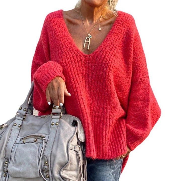 Dame afslappet V-hals sweater med volumøse ærmer og fint strukturmønster Stilla