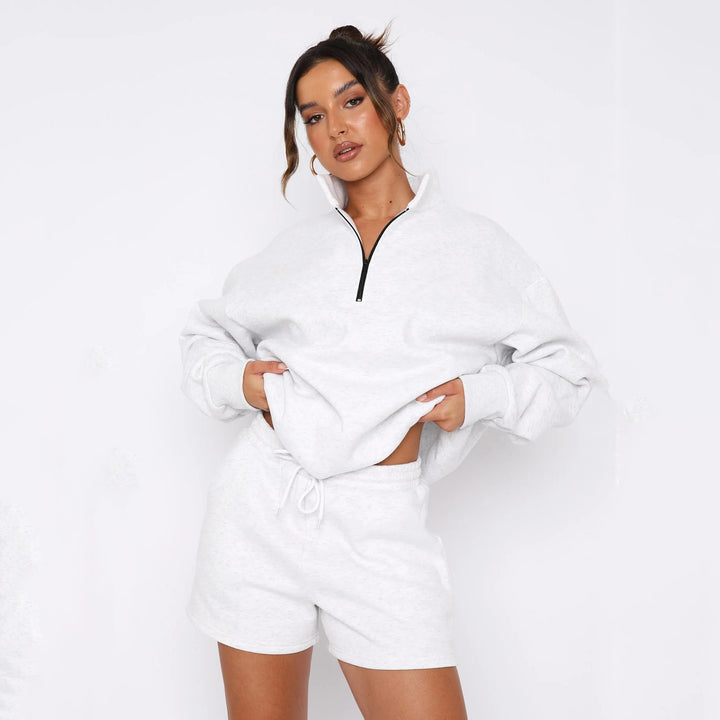 Damer sporty fritidssæt med kort top og elastisk talje