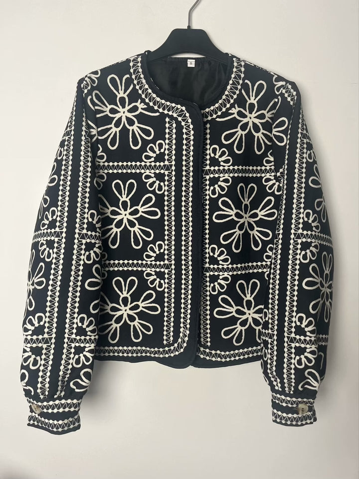 Kvinders patchwork designjakke med blomster mønster og elegante applikationer Stilla