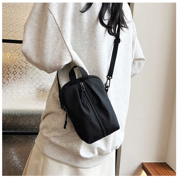 Dame Compact Crossbody Bag med lynlås Stilla