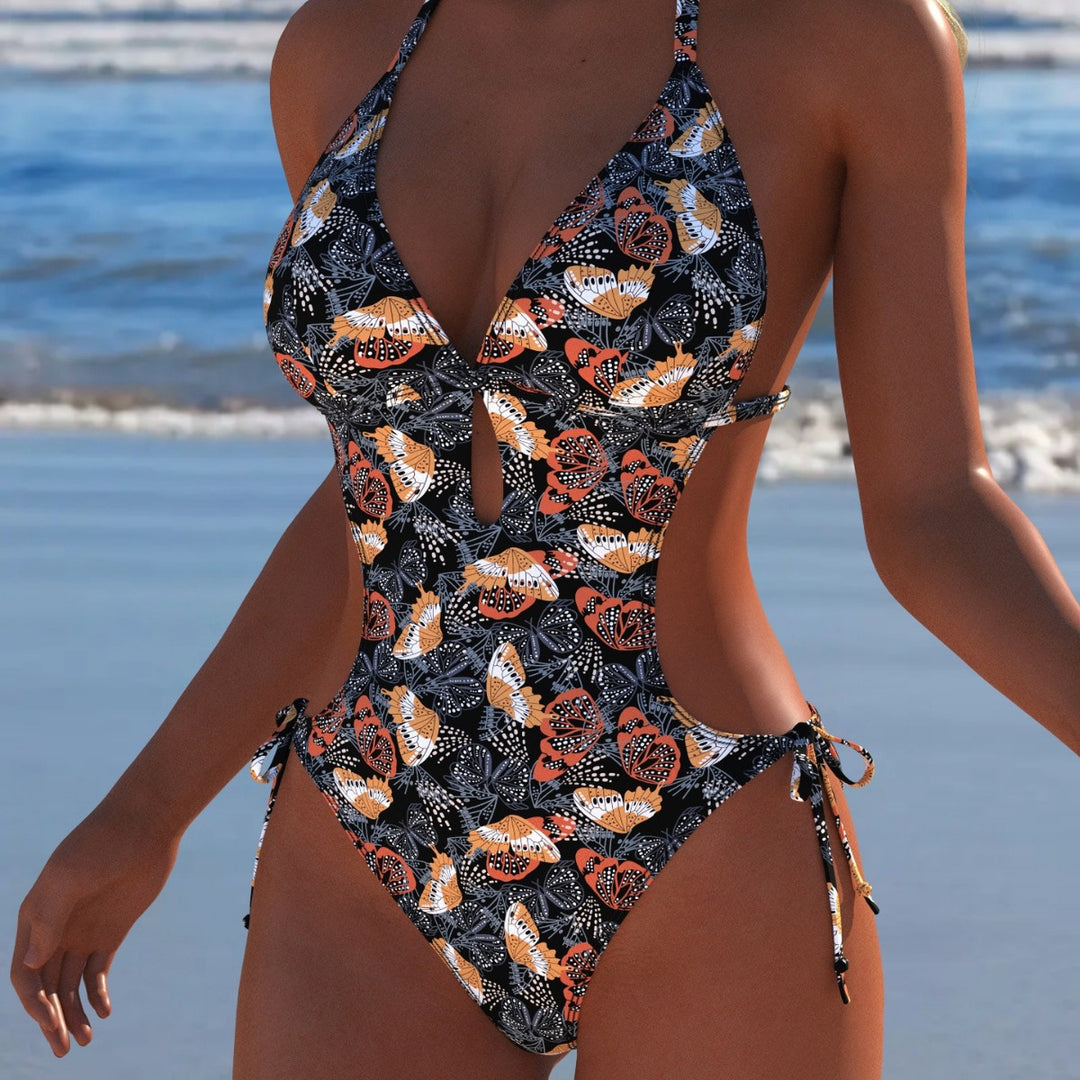 Dame Énse-piece badedragt med floral cut-out-design og justerbare bindebånd Skovae