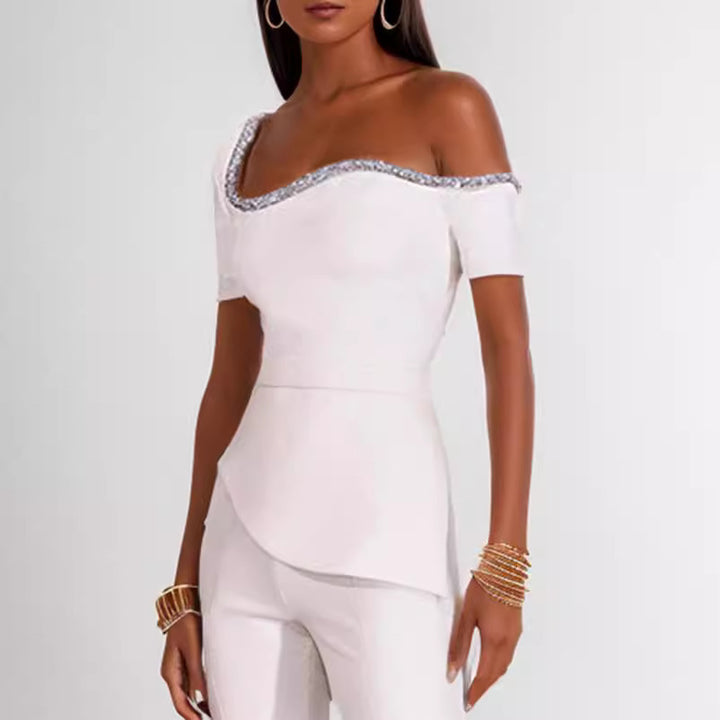 Dame off-shoulder top med raffineret flæse og elegant bukse-sæt Stilla