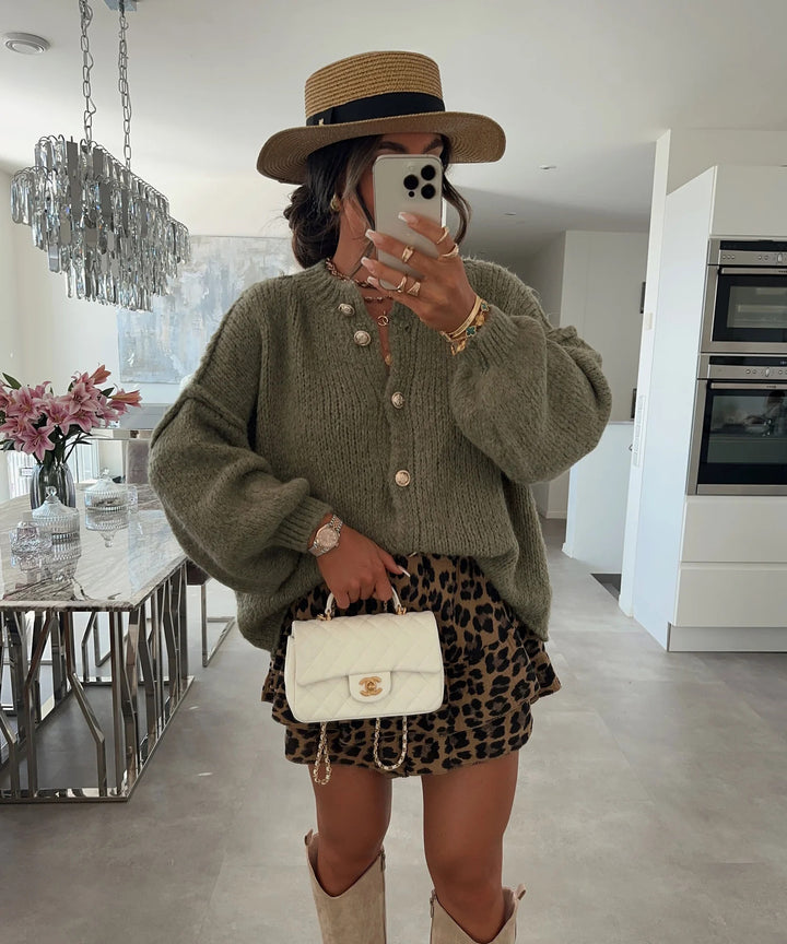 Kvinders fashionable cardigan med oversized ærmer og knapdetaljer Stilla