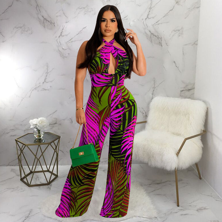 Dame elegant jumpsuit med afslappet halter-design og iøjnefaldende bladmønster Stilla