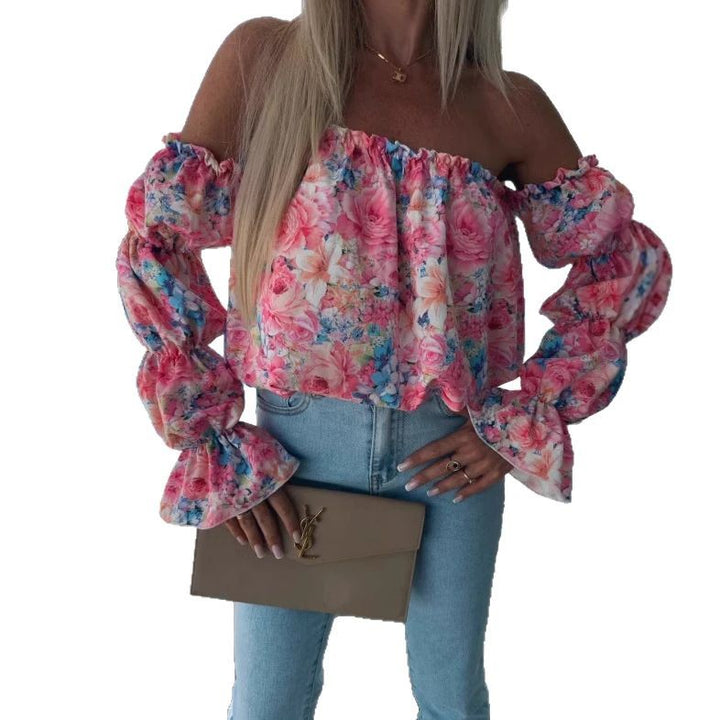 Dame Off-Shoulder Bluse med voluminiøse ærmer og floral design Stilla