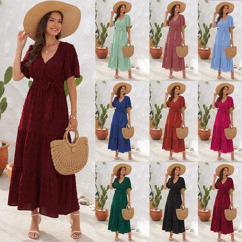 Dame maxikjole med flydende snit og feminint omslagdesign Skovae