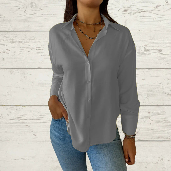 Dame moderne bluse med skinnende stof Stilla