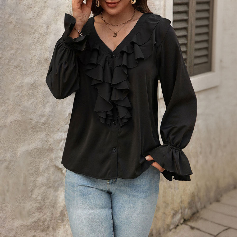 Damebluse med elegante ruffle-detaljer og chic V-hals Stilla