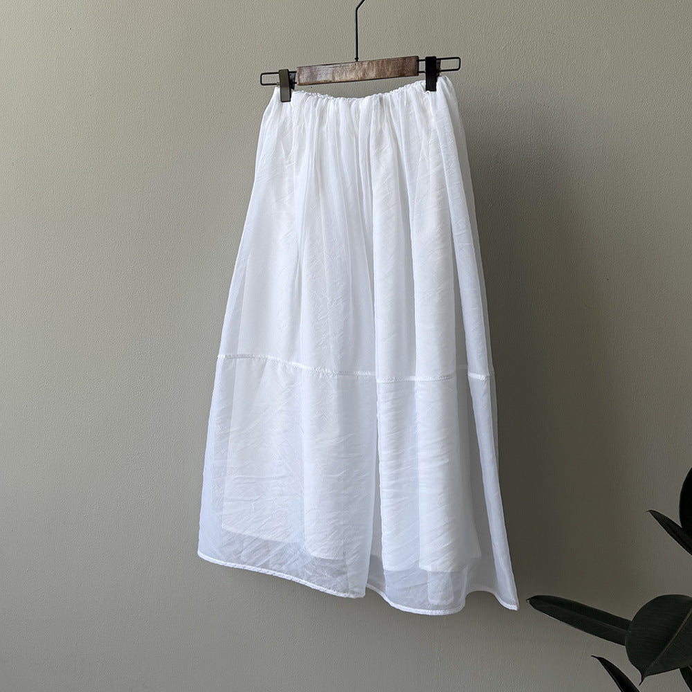 Dame Maxiskirt i let, åndbart materiale med elastisk talje og elegant snit Stilla