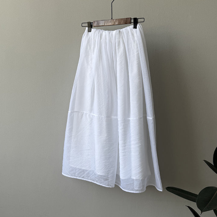 Dame Maxiskirt i let, åndbart materiale med elastisk talje og elegant snit Stilla