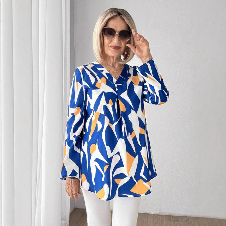 Damebluse med iøjnefaldende grafikdesign Stilla