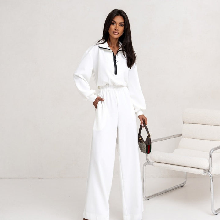 Dame sporty jumpsuit med høj krave og moderne lynlås Skovae