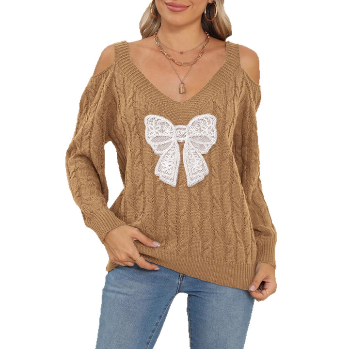 Dame moderigtig sweater med legende strikket sløjfemotiv Skovae