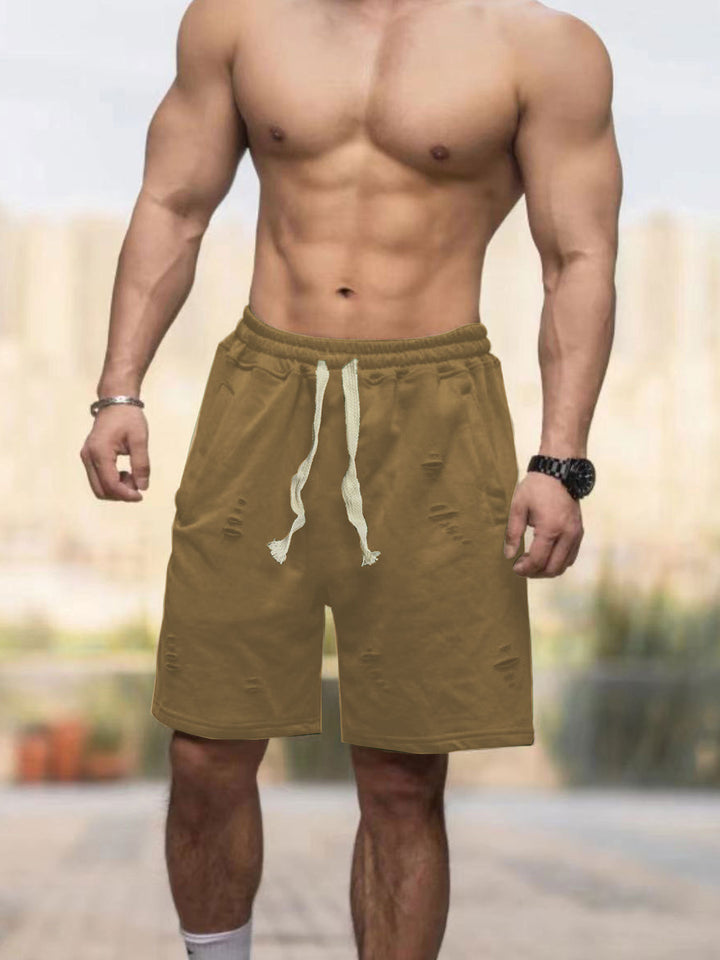 Herrer med afslappede sweatshorts med elastisk tunneltrækbånd, sidelommer og brugt-look Skovae