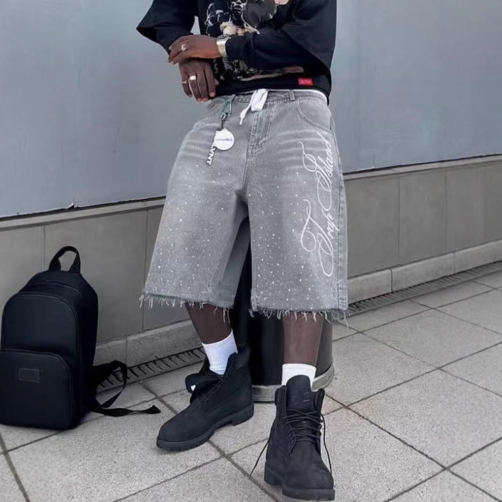 Herre afslappede denim shorts med frynset kant og grafisk tryk Stilla