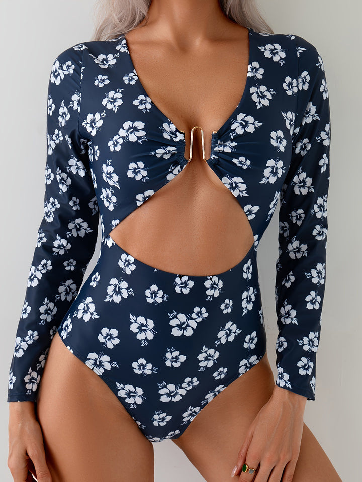 Dame én deler badedragt med floralt cut-out og dekorativ twist Stilla