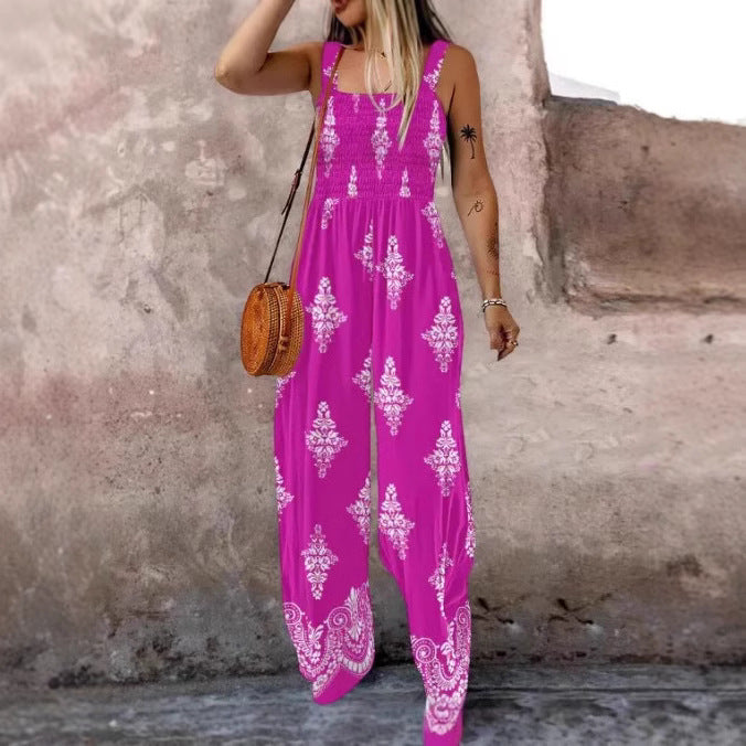 Dame jumpsuit med elastisk taljebånd og blomsterdekorationer Skovae