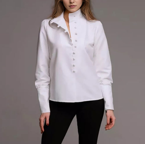 Damebluse med høj ståkrave og elegante pufærmer Stilla