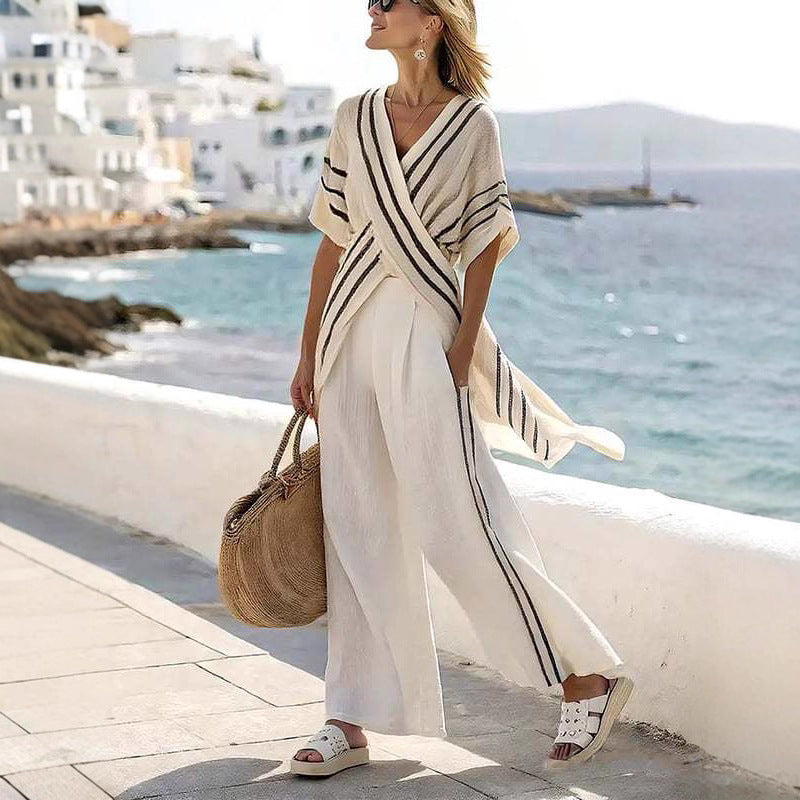Dame nan resort-inspireret sæt med krydset kimono-tunika og højt skåret palazzo-bukser Skovae