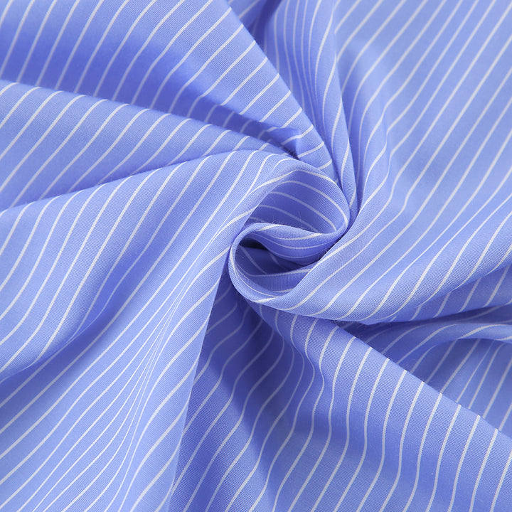 Damebluse med taillieret snit og ruffle detaljer Stilla