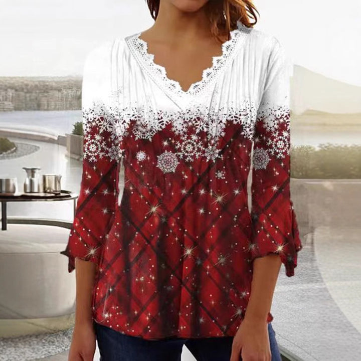 Dame nan tunika-bluse med spids v-hals, fin plissé-patch og vinterligt snefnug-print skovae