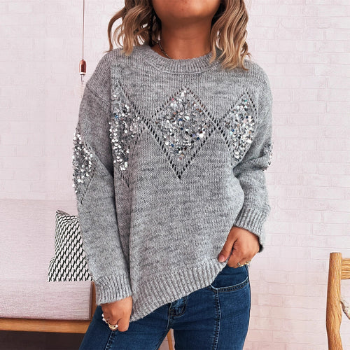 Kvinders elegante strikket sweater med glitrende paletakker Stilla